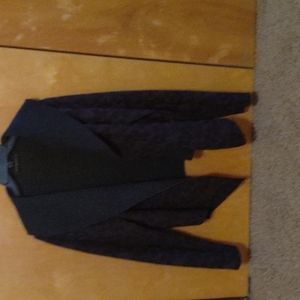 Fun cut.loose tuxedo style jacket